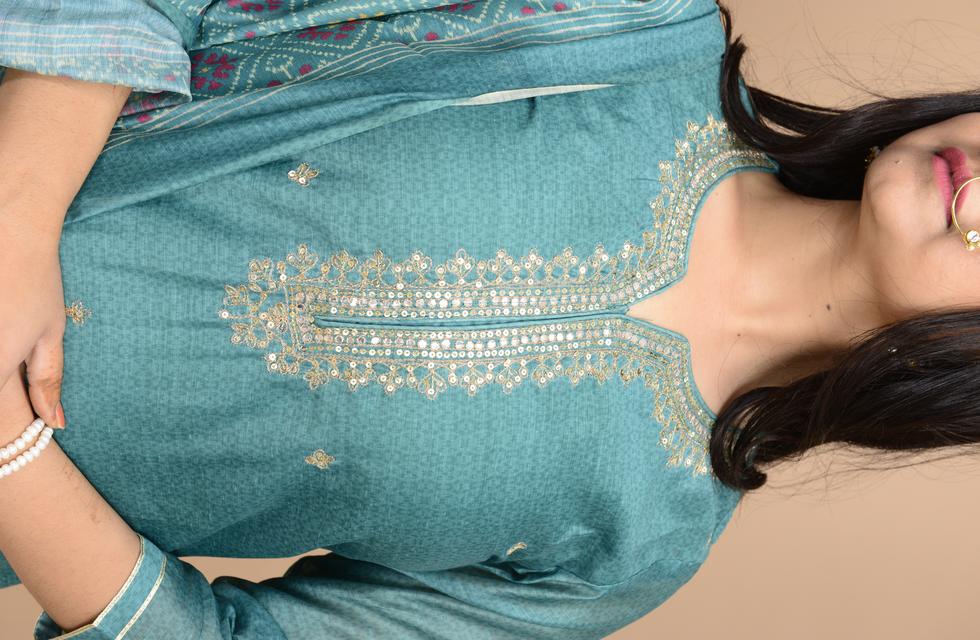Gorgeous Pure Chanderi Suit Set With Aari Tari Work In Bottle Green Color